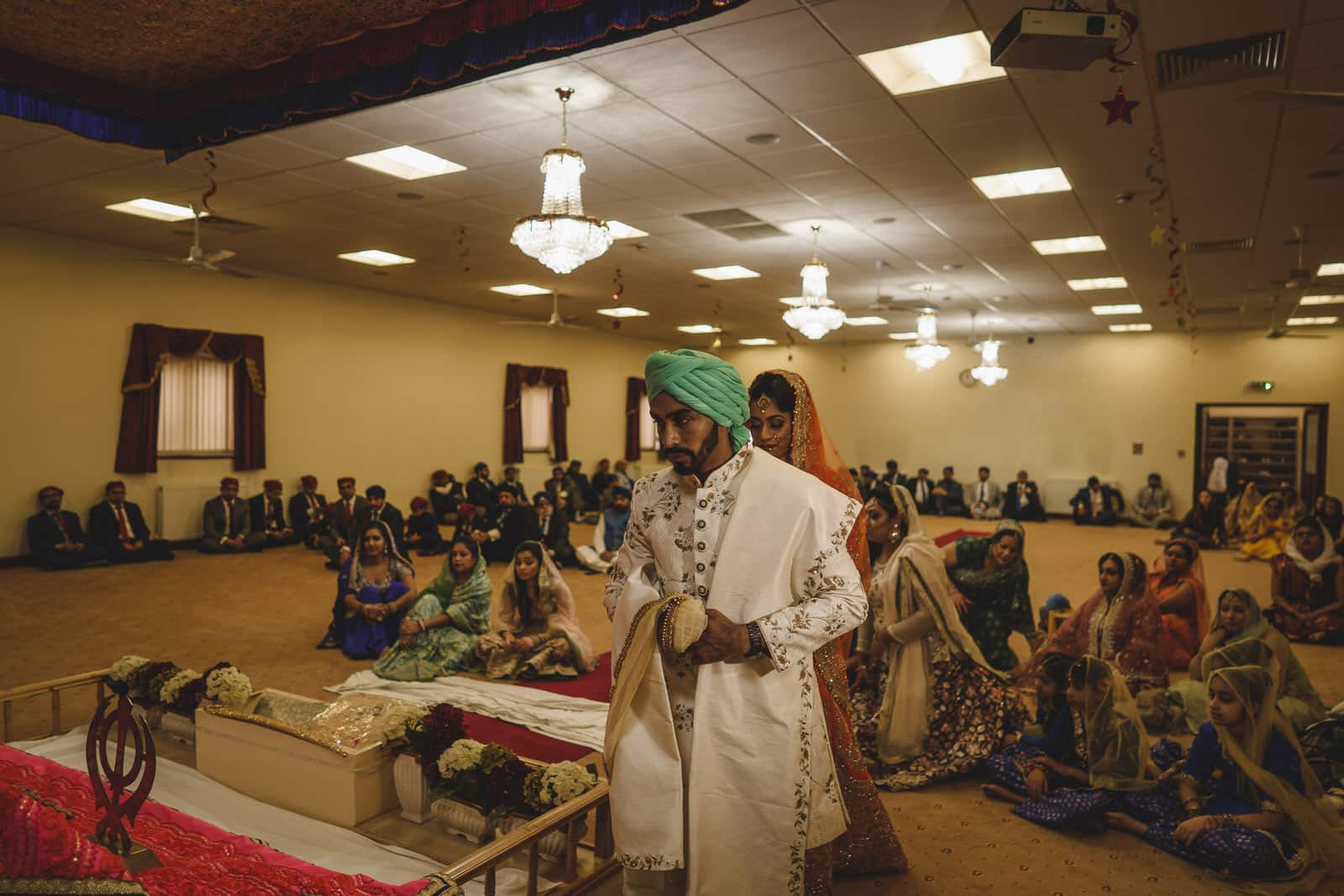 Wolverhampton Asian Wedding Photographer captures bride and groom in temple